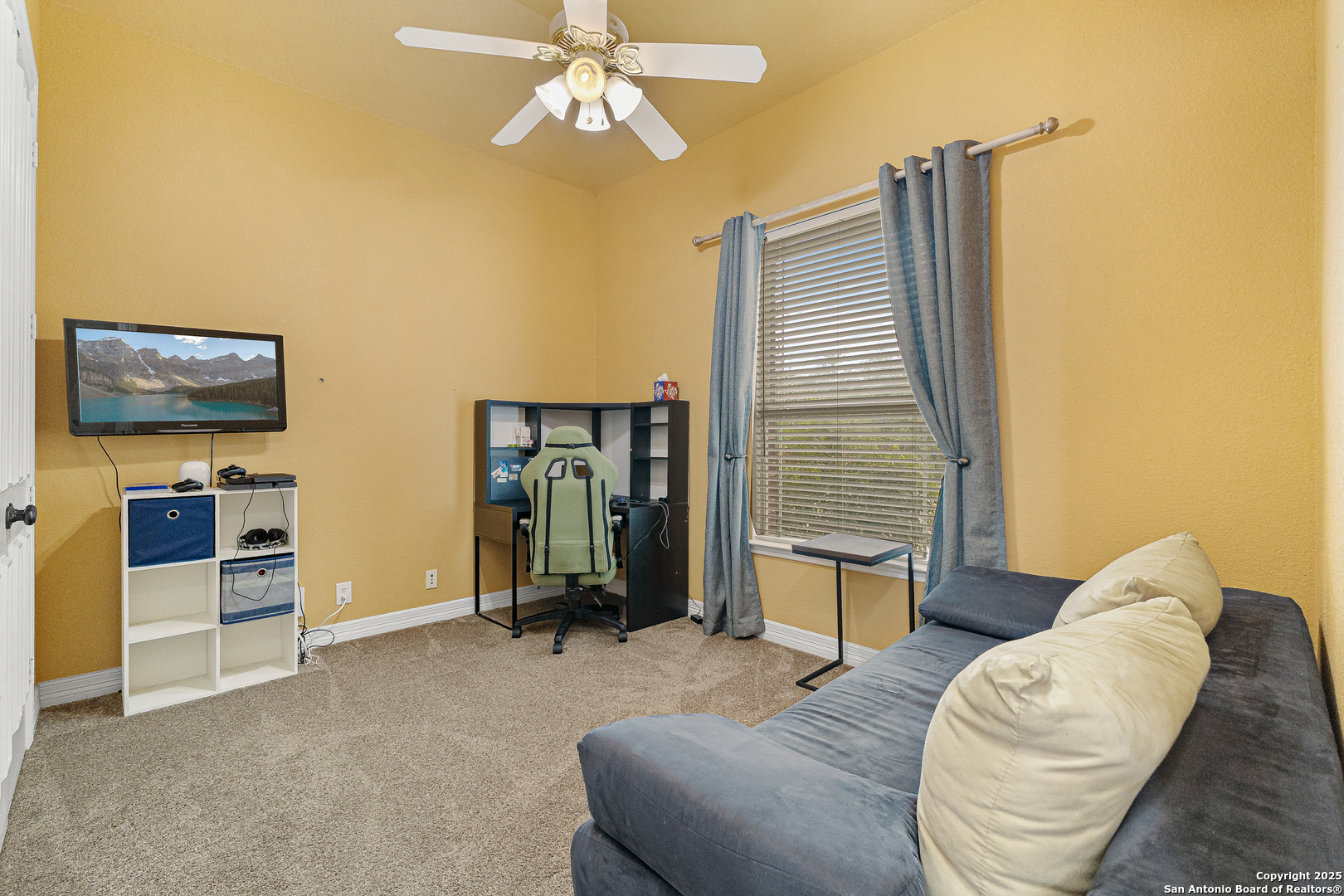 418 Texas Point San Antonio, TX 78258 - Photo 14 of 31 a living room with furniture and a flat screen tv