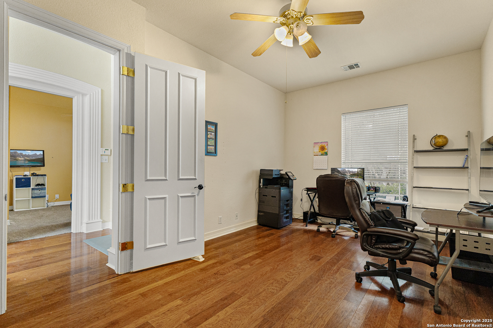 418 Texas Point San Antonio, TX 78258 - Photo 16 of 31 a view of a workspace with furniture and a window