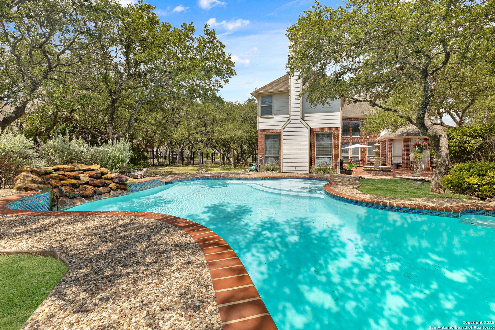 418 Texas Point San Antonio, TX 78258 - Photo 2 of 31 a front view of a house with garden