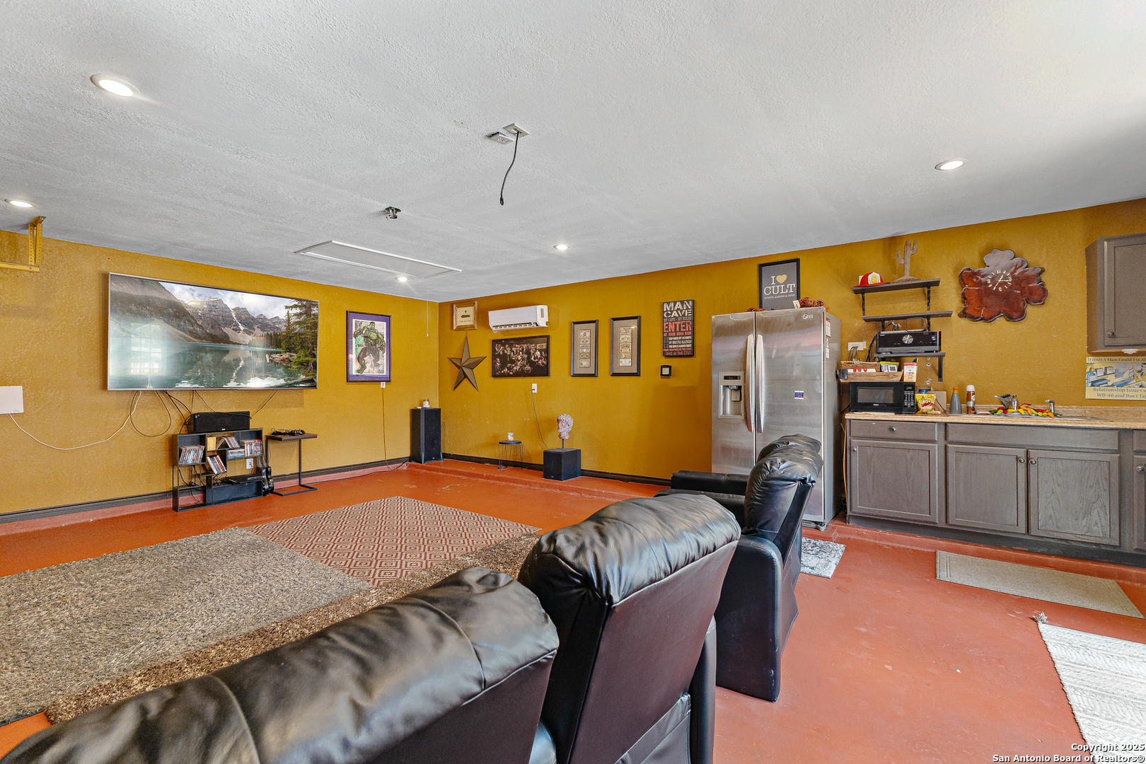 418 Texas Point San Antonio, TX 78258 - Photo 28 of 31 a bed room with a bed furniture and a flat screen tv