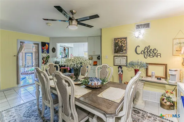 a view of a dining room with furniture