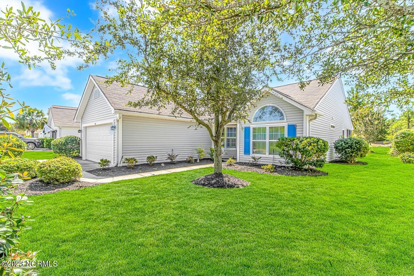 933 Wyndfall Drive Southwest Sunset Beach, NC 28468 - Photo 1 of 39 933 Wyndfall DrFront exterior