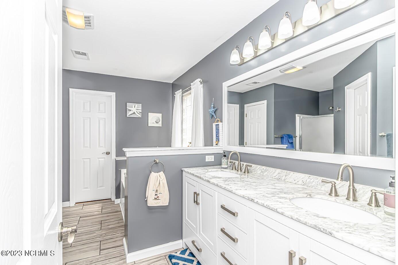 933 Wyndfall Drive Southwest Sunset Beach, NC 28468 - Photo 18 of 39 Primary bath