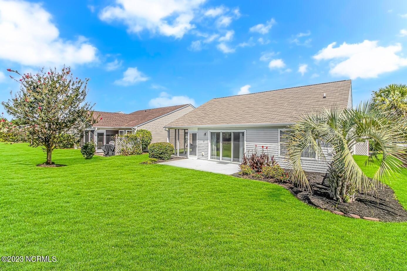 933 Wyndfall Drive Southwest Sunset Beach, NC 28468 - Photo 22 of 39 Back exterior