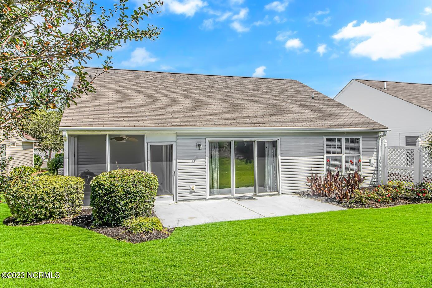 933 Wyndfall Drive Southwest Sunset Beach, NC 28468 - Photo 23 of 39 Back exterior