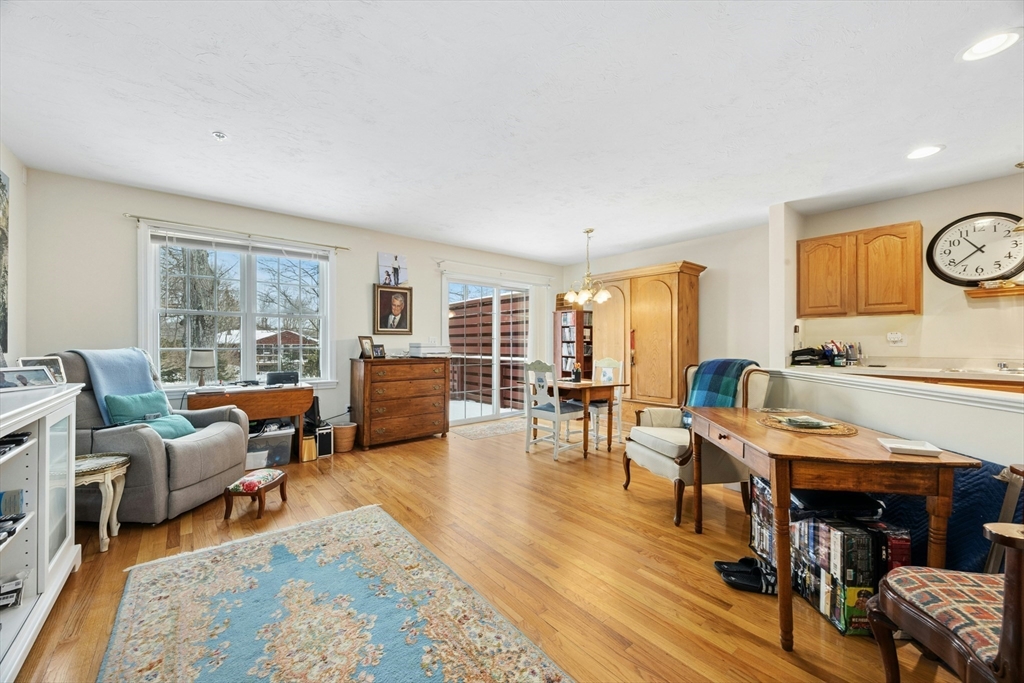 22 Village Way, Unit 22 Rutland, MA 01543 - Photo 1 of 39 a living room with furniture and wooden floor