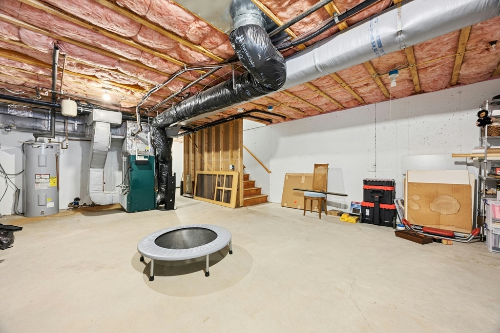 22 Village Way, Unit 22 Rutland, MA 01543 - Photo 24 of 39 a view of a chairs in garage