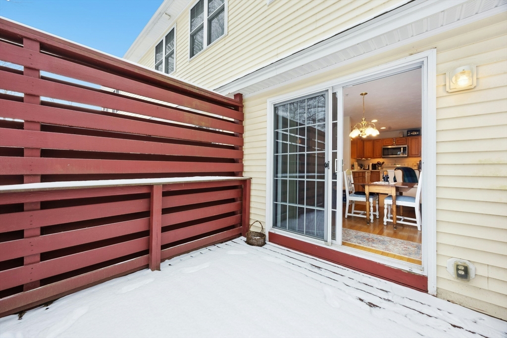 22 Village Way, Unit 22 Rutland, MA 01543 - Photo 25 of 39 a view of a house with a large window