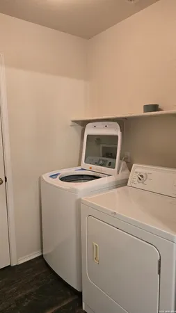 a utility room with dryer and washer