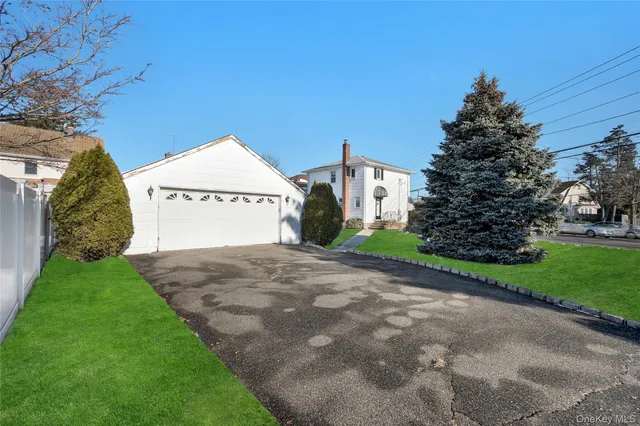 $769,000 | 212 Newbridge Road, Hicksville, NY 11801