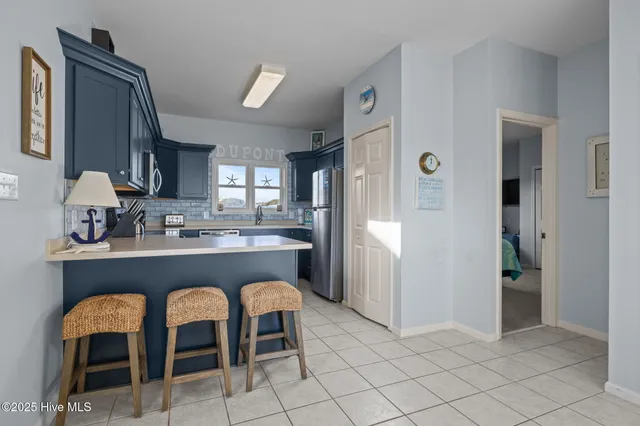 $1,200,000 | 7121 Ocean Drive, Unit WEST, Emerald Isle, NC 28594