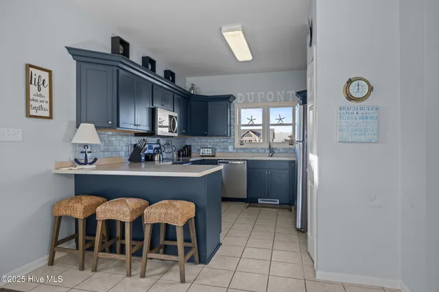 $1,200,000 | 7121 Ocean Drive, Unit WEST, Emerald Isle, NC 28594