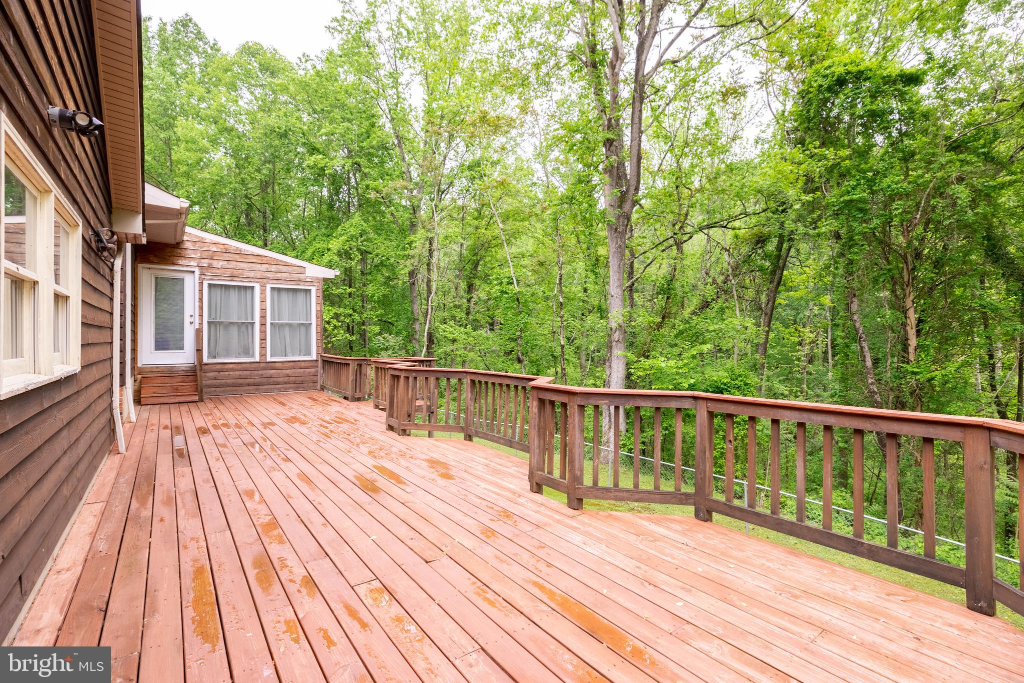 5218 Caledon Road King George, VA 22485 - Photo 13 of 59 Deck and door to sunroom