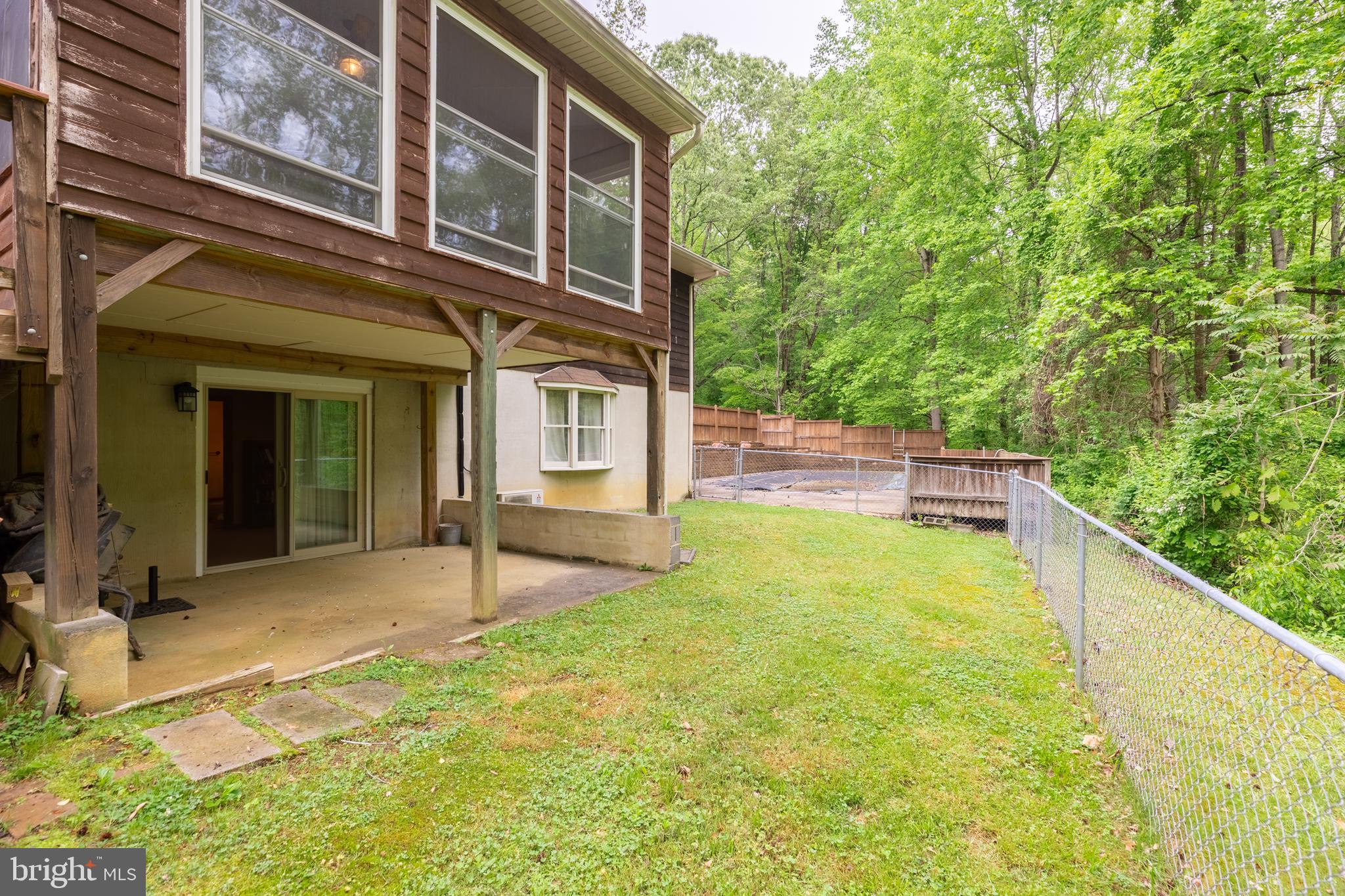 5218 Caledon Road King George, VA 22485 - Photo 56 of 59 Basement sliding door to patio and fenced yard