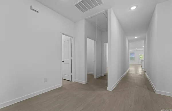 an empty room with a bathroom