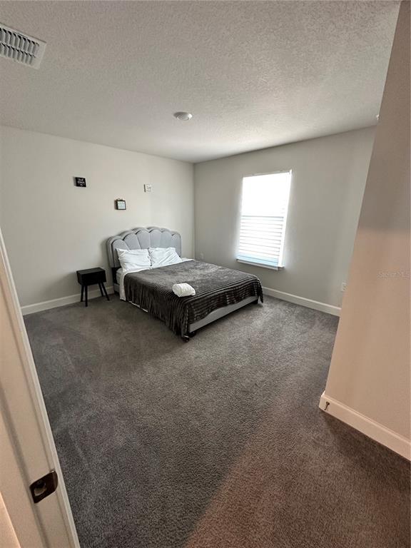 36097 Welsh Glade Road Dade City, FL 33525 - Photo 26 of 35 a living room with furniture