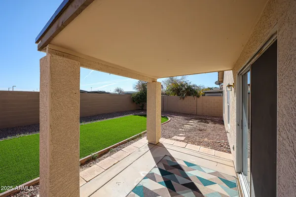 a view of a porch with a yard
