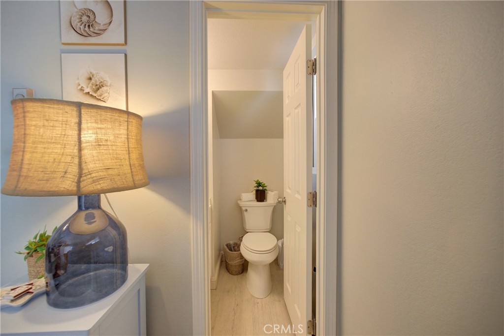 2650 Main Street, Unit 7 Cambria, CA 93428 - Photo 16 of 50 a bathroom with a granite countertop sink and a mirror