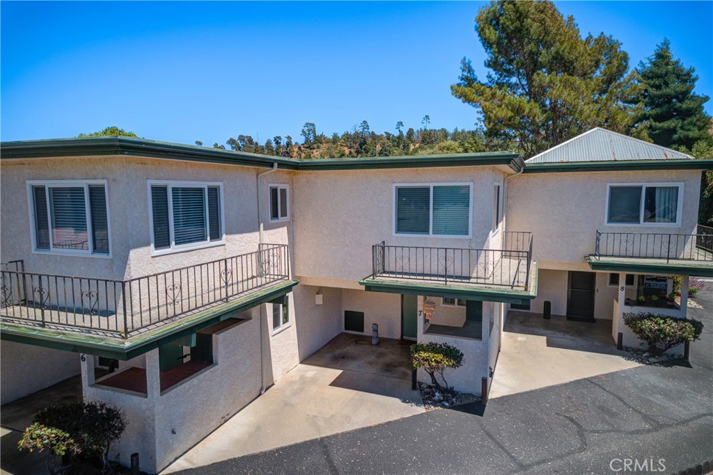 2650 Main Street, Unit 7 Cambria, CA 93428 - Photo 43 of 50 a view of a house with a wooden deck