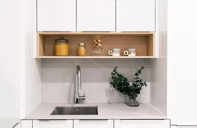 a vase of flowers sitting on a table