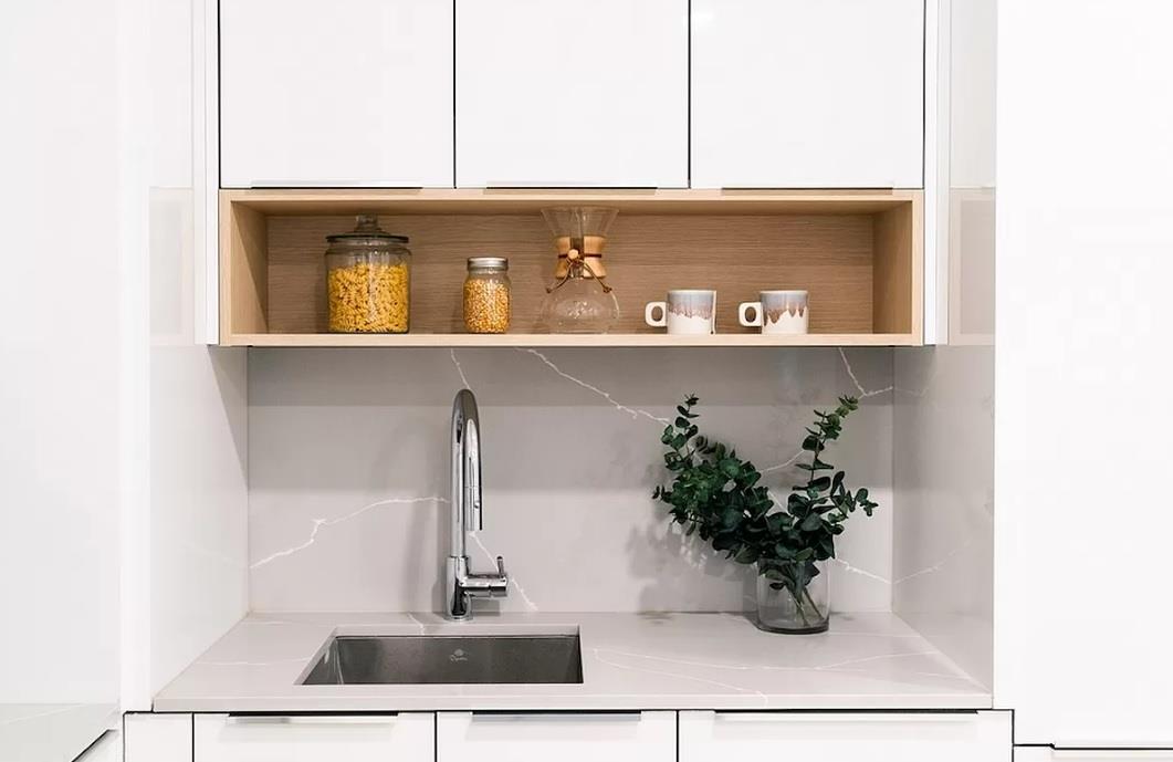 20 Broad Street, Unit 2704 Manhattan, NY 10005 - Photo 1 of 5 a vase of flowers sitting on a table