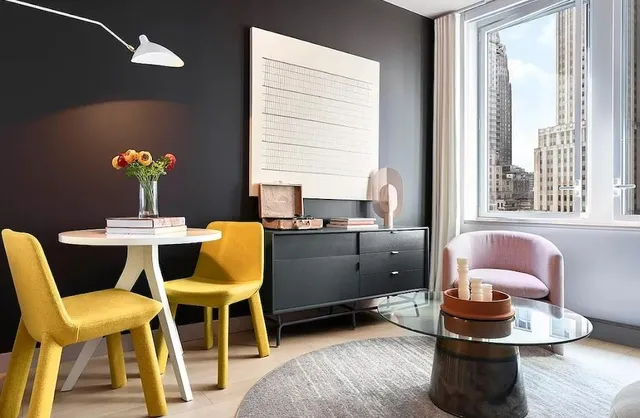 a living room with furniture and a window