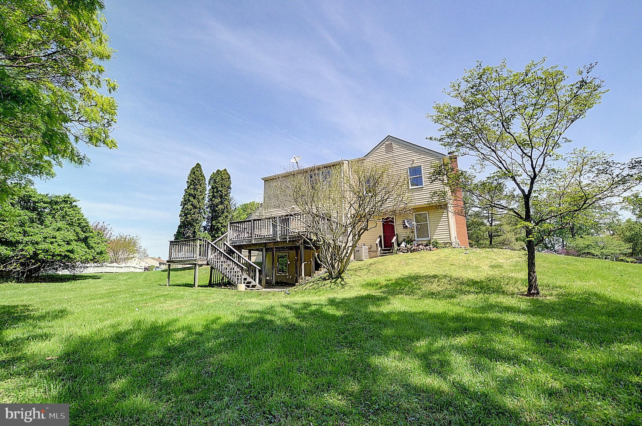 14417 Jaystone Drive Silver Spring, MD 20905 - Photo 17 of 30 a view of a house with a yard