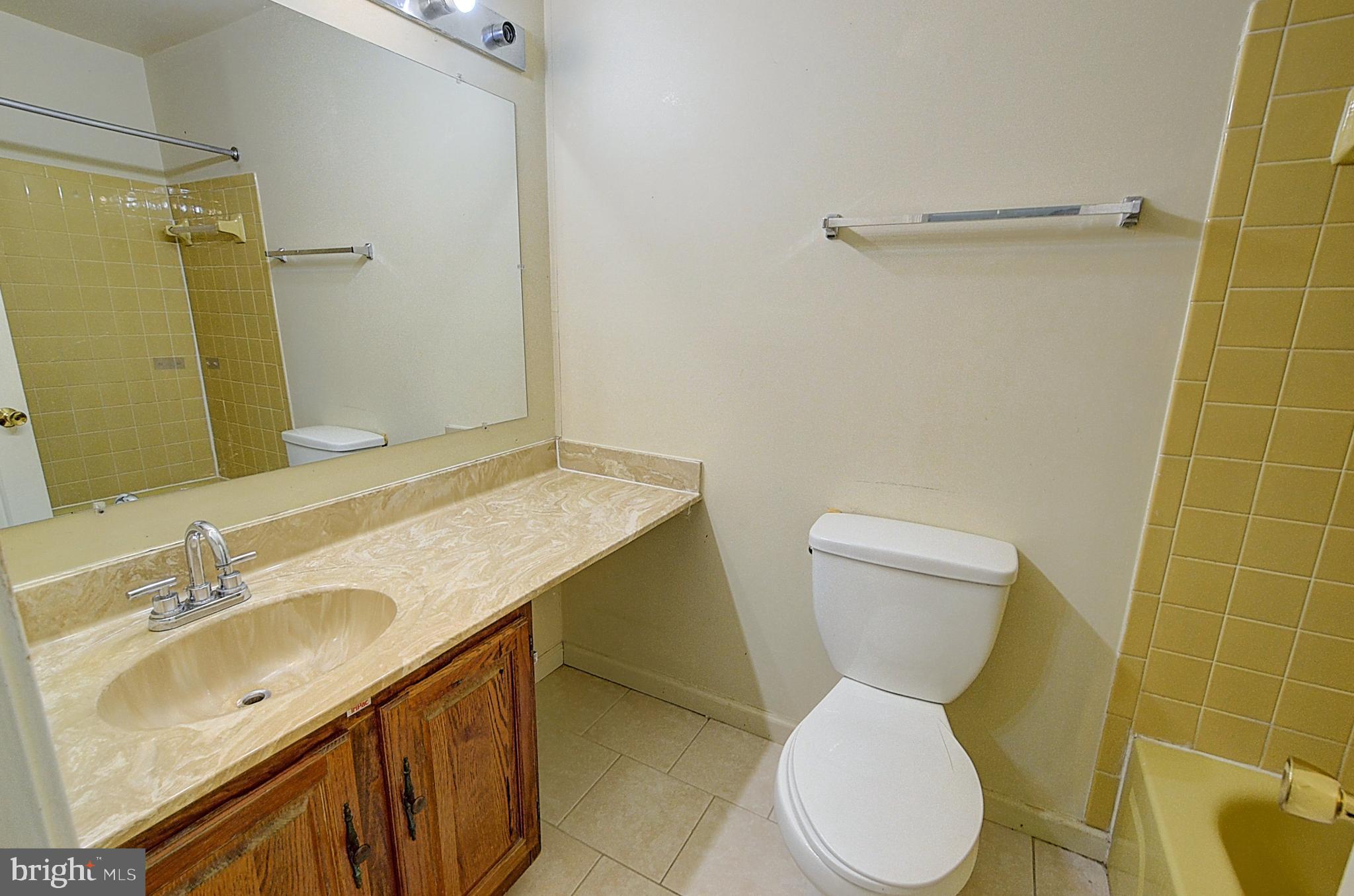 14417 Jaystone Drive Silver Spring, MD 20905 - Photo 23 of 30 a bathroom with a sink toilet and shower