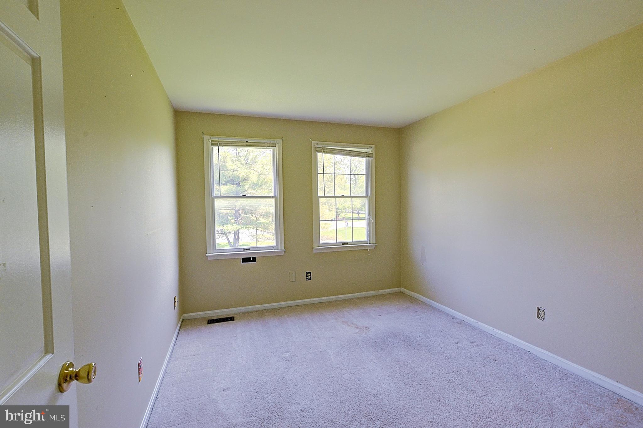 14417 Jaystone Drive Silver Spring, MD 20905 - Photo 25 of 30 an empty room with windows