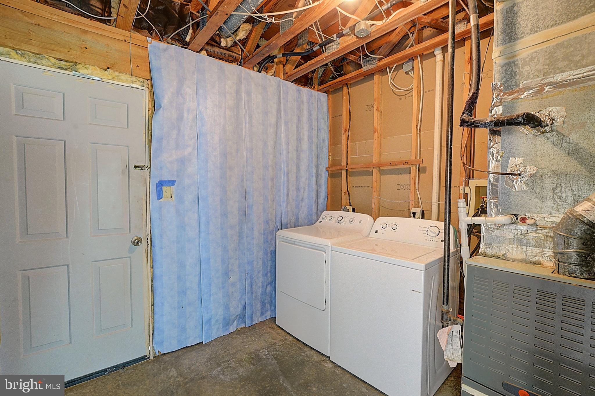 14417 Jaystone Drive Silver Spring, MD 20905 - Photo 30 of 30 a utility room with dryer and washer