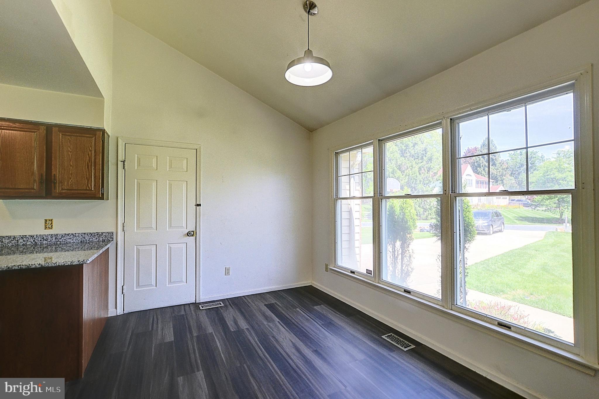 14417 Jaystone Drive Silver Spring, MD 20905 - Photo 9 of 30 a view of a kitchen with a sink and a window