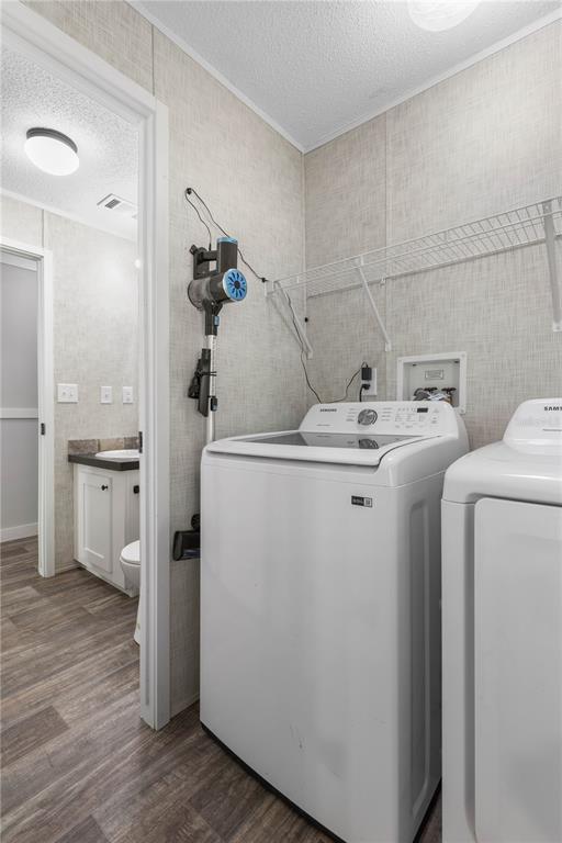 1688 Papaya Street Bunnell, FL 32110 - Photo 31 of 63 a utility room with dryer and washer