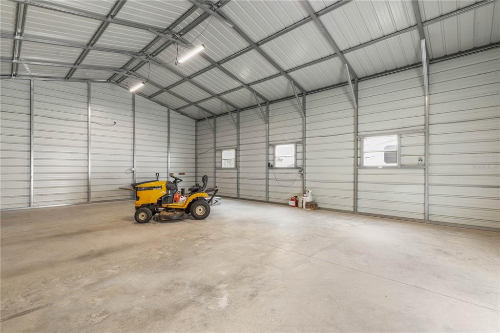 1688 Papaya Street Bunnell, FL 32110 - Photo 37 of 63 a view of a garage with storage