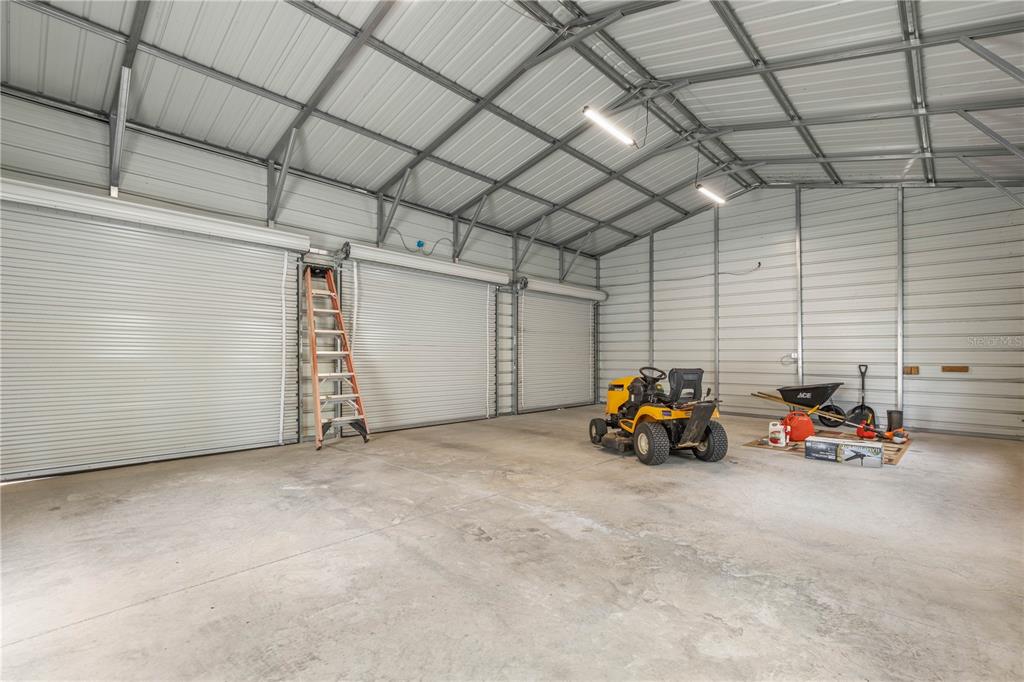 1688 Papaya Street Bunnell, FL 32110 - Photo 38 of 63 a view of a garage with toys