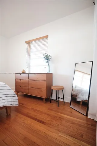 a bathroom with a shower and a shower curtain