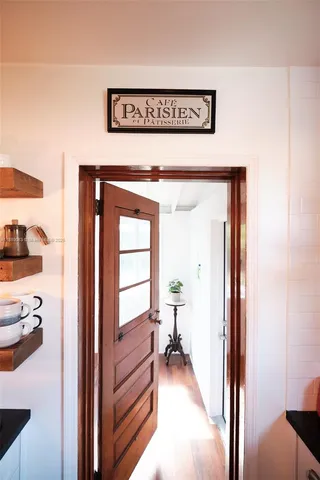 a bedroom with two beds and a window