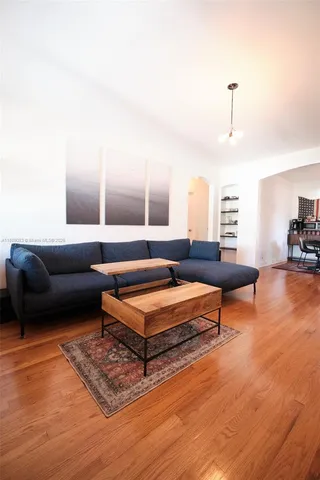 a bedroom with a bed and a cabinets