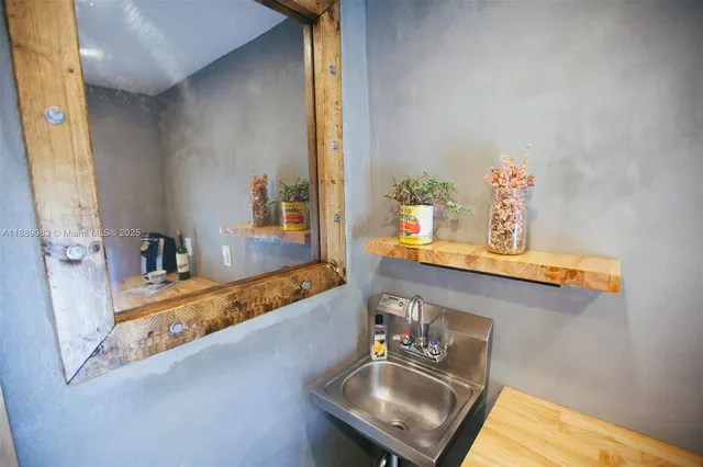 a bathroom with a toilet and a sink