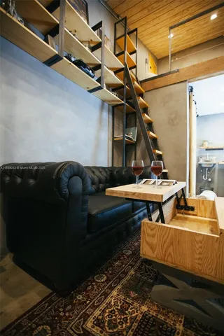 a view of house with backyard outdoor seating and green space