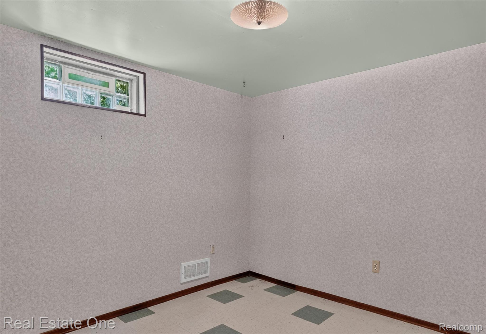6039 Fish Lake Road Holly, MI 48442 - Photo 33 of 64 Finished bonus flex room in the basement.