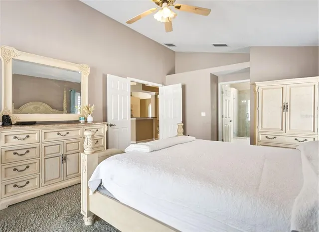 a bathroom with a sink a mirror and shower