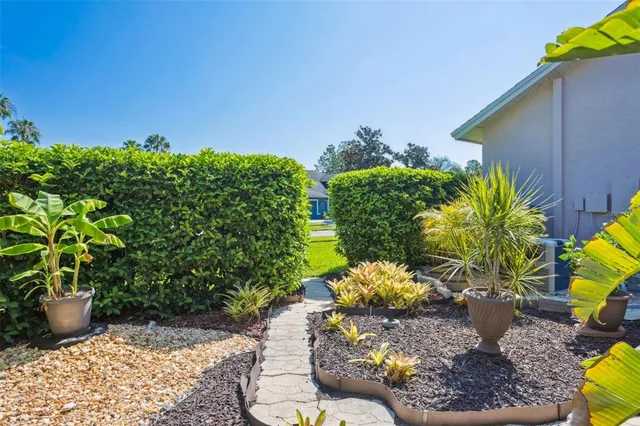 an aerial view of houses with outdoor space