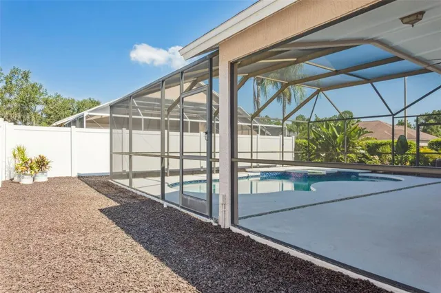 an aerial view of residential houses and outdoor space
