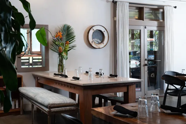 a living room with furniture and window