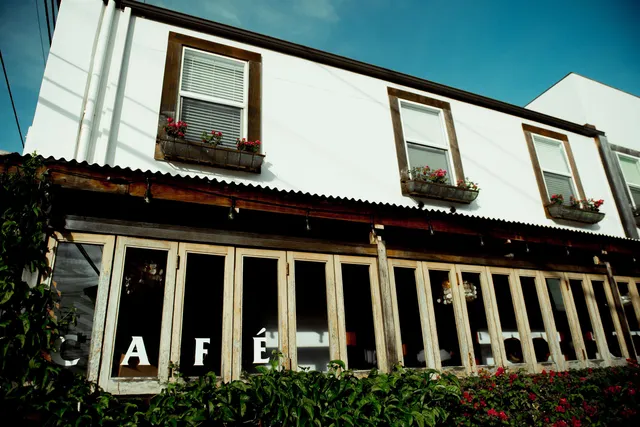 a view of balcony with furniture and window