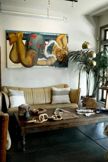 a bedroom with a bed and a chair