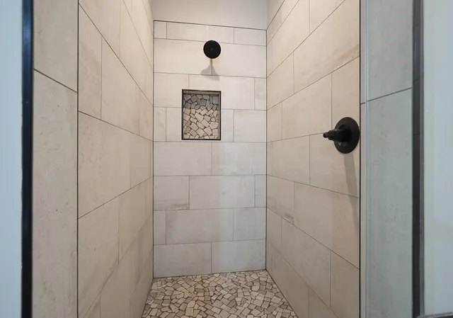 a view of a room with racks on the wall