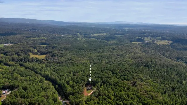 a picture of a bathroom with a shower