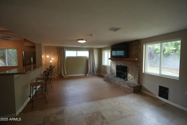 a view of a livingroom with a fireplace