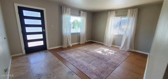 an empty room with windows